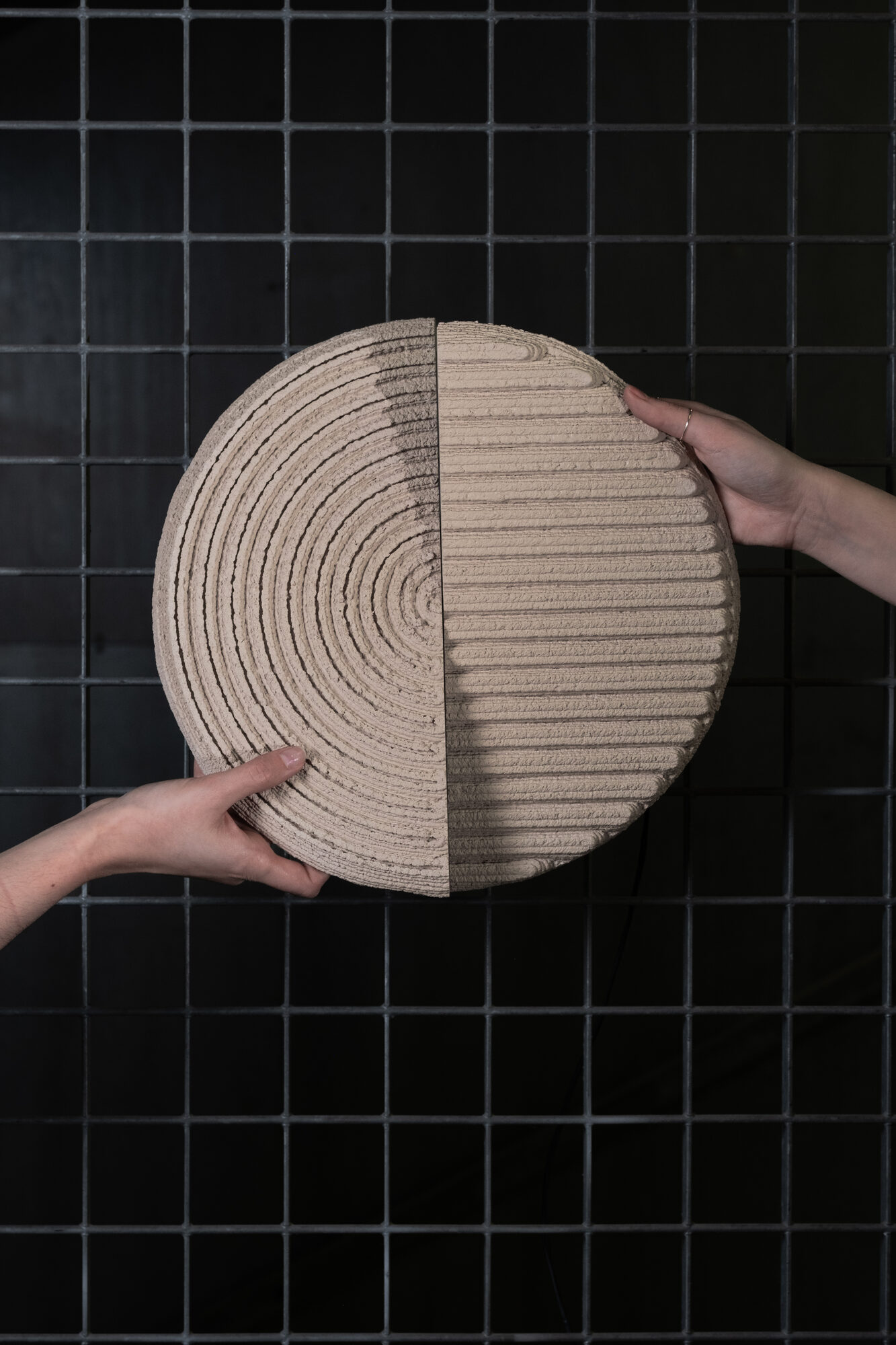 Doppiosenso — held by hand, showing scale and the two patterns